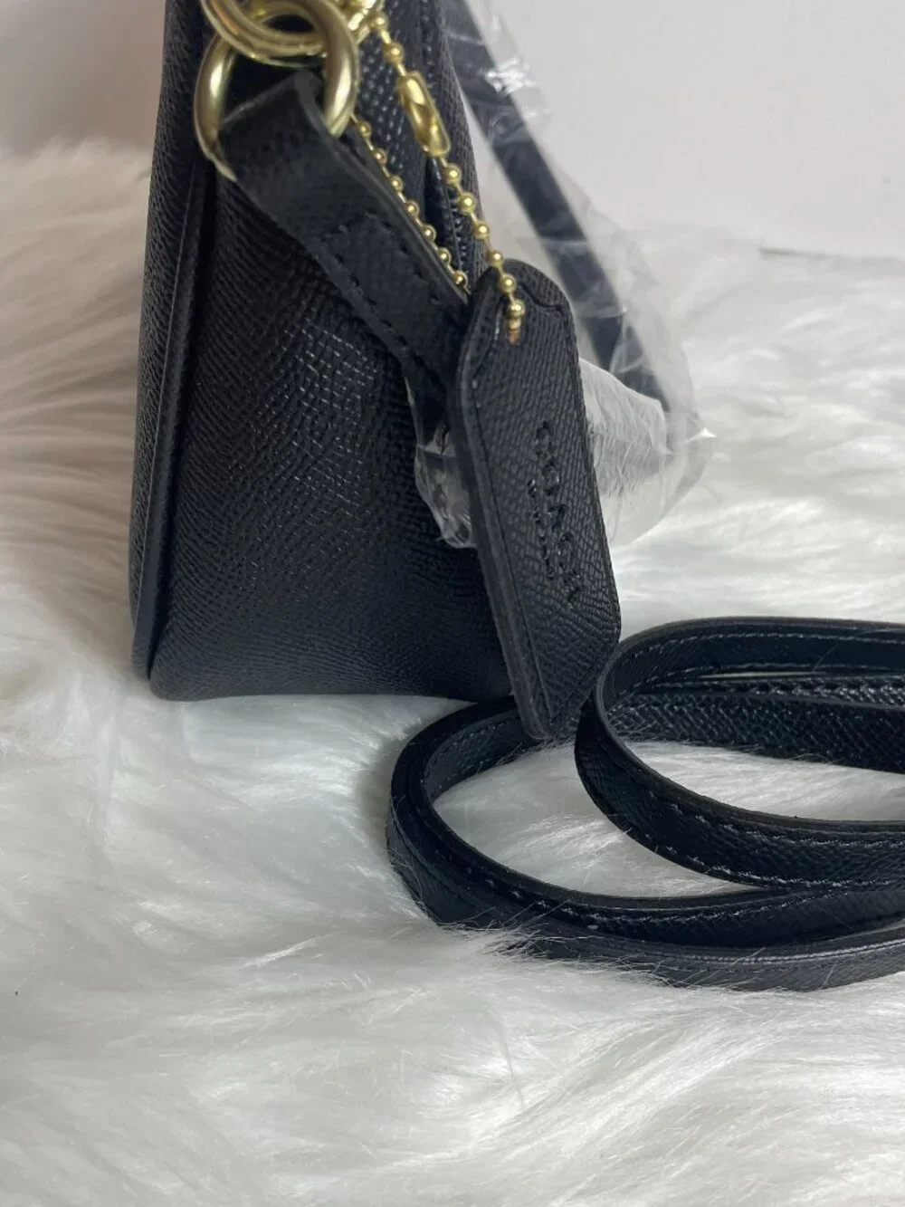 Black zipper top small shoulder bag with extra long strap